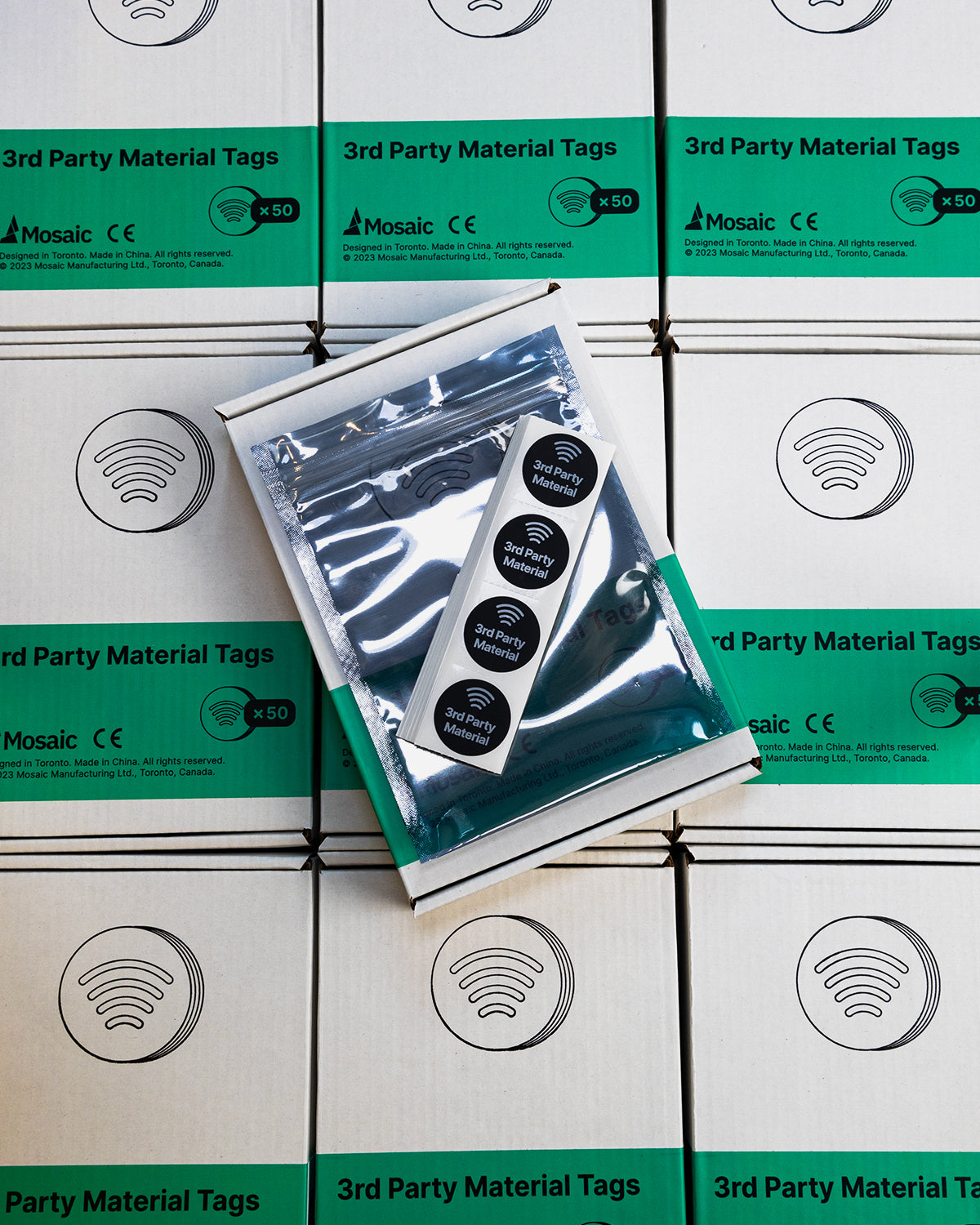 A pack of 3rd Party Material Tags displayed on top of its packaging, with multiple tags visible inside a clear plastic envelope.